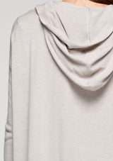 [Color: Heather Stone] A soft knit grey cardigan with an open front, a hoodie, and two side pockets. 