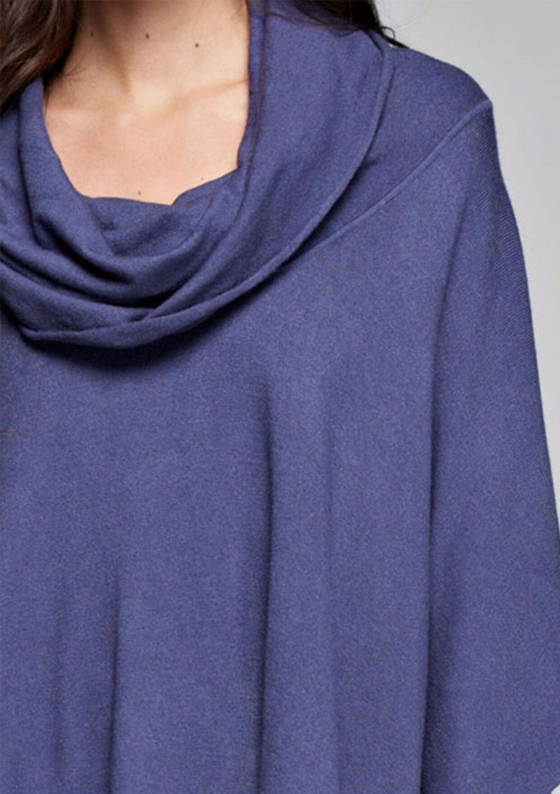 [Color: Indigo Blue] A classic bohemian fringed sweater poncho with oversized cowl neckline. 