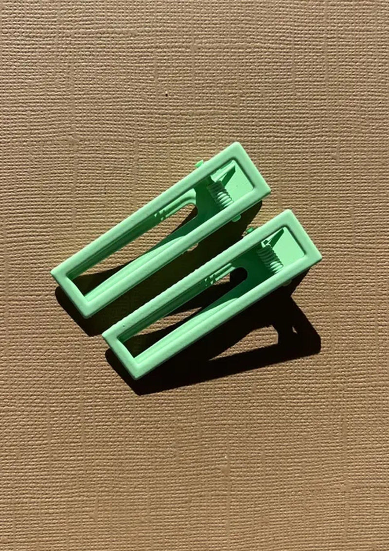 [Color: Minty] A light green alligator hair clip. Comes in a set of two.