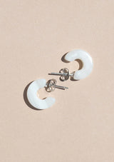 [Color: Shell] A small shell white acetate hoop earring. 