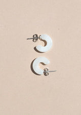 [Color: Shell] A small shell white acetate hoop earring. 