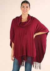 [Color: Merlot] A classic bohemian fringed sweater poncho with oversized cowl neckline. 