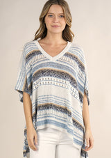 [Color: Oatmeal/Blue] A lightweight bohemian sweater poncho pullover top in a mixed stripe. With short sleeves, a v neckline, and a relaxed fit. 