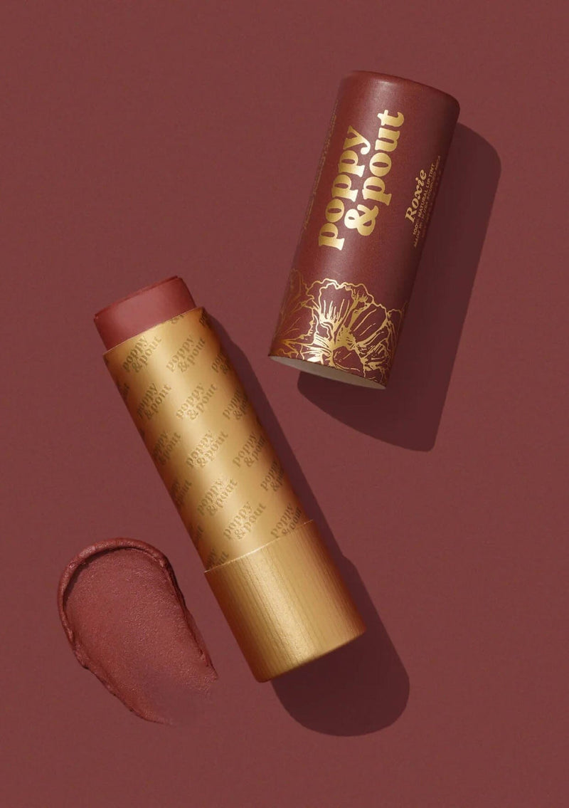 [Color: Roxie] A buildable lip tint made from 100% natural ingredients. An eco-friendly beauty product handmade from Poppy & Pout. 