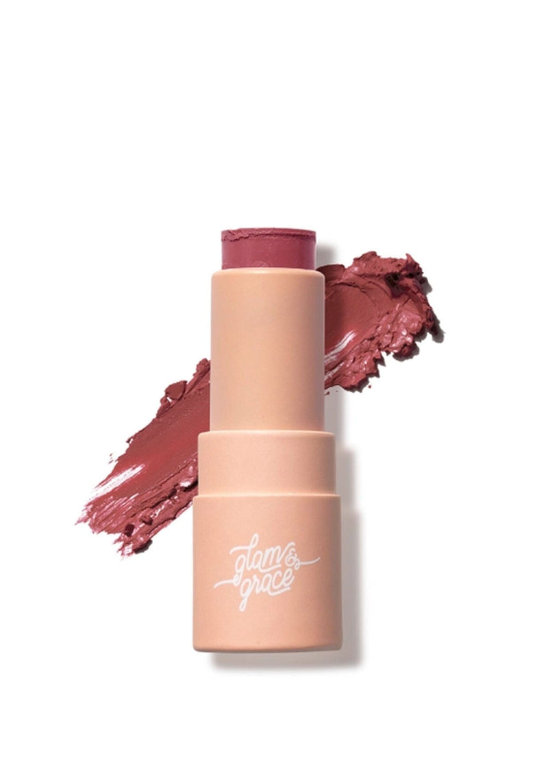 [Scent: Fine Wine] A moisturizing semi-matte lip balm in a deep pink red tone, enriched with coconut oil for all-day comfort. Created by Glam & Grace.