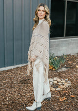 [Color: Mushroom]  An ultra bohemian crochet fringed tan poncho sweater.