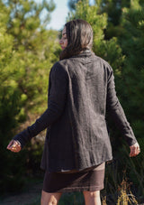 [Color: Charcoal] A cozy cardigan sweater, featuring essential side pockets and a chic vegan faux leather trim. 