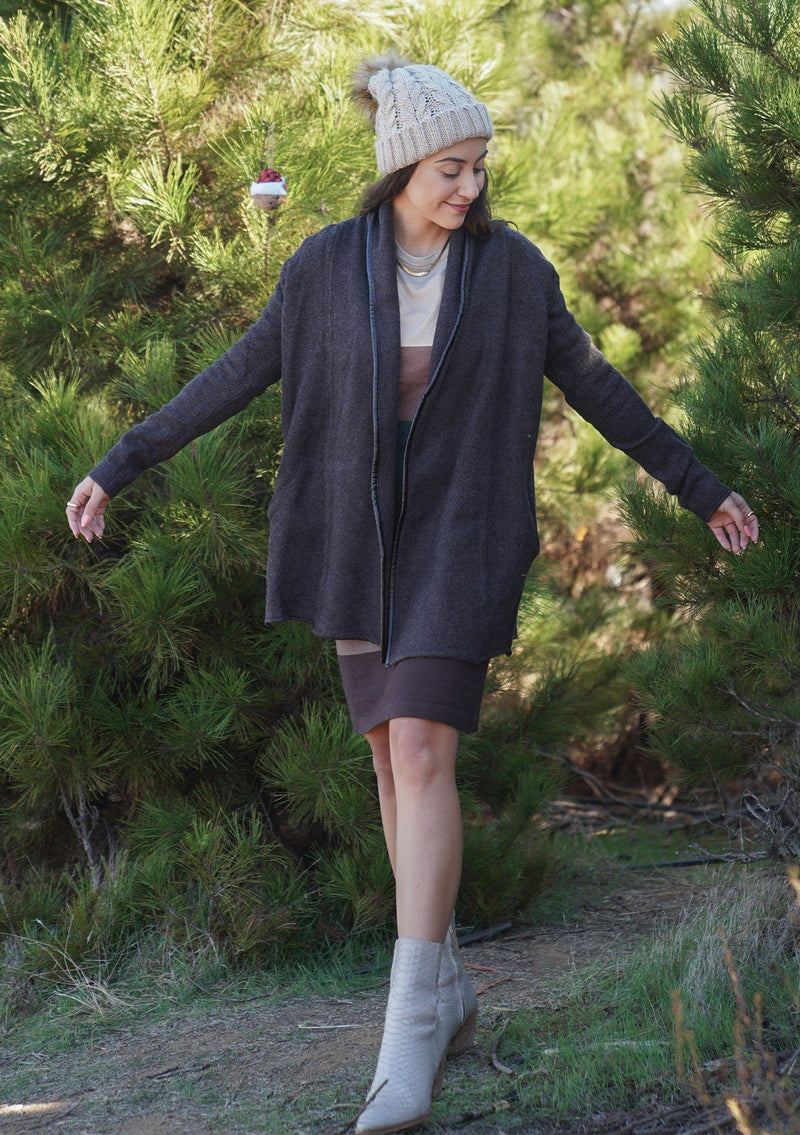 [Color: Charcoal] A cozy cardigan sweater, featuring essential side pockets and a chic vegan faux leather trim. 