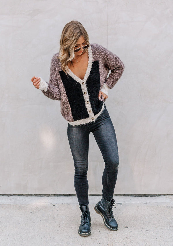 [Color: Vanilla Black] An ultra warm color block cardigan in a soft fuzzy popcorn. Featuring a classic tortoiseshell button up front, a flattering v neckline, and a contrast trim.