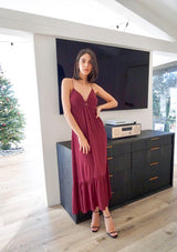 [Color: Merlot] A stunning sleeveless tiered maxi dress, featuring a sexy back cutout, a flattering empire waist, and a flirty v neckline with twist detail.