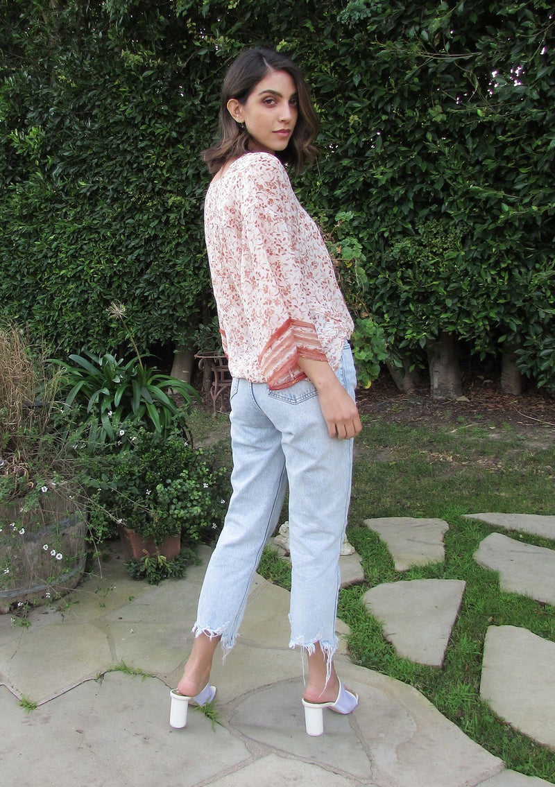 [Color: Brick/Ivory] Girl wearing a floral bohemian surplice top with kimono sleeves. 