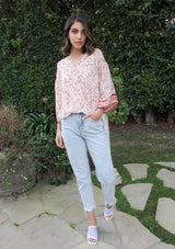 [Color: Brick/Ivory] Girl wearing a floral bohemian surplice top with kimono sleeves. 