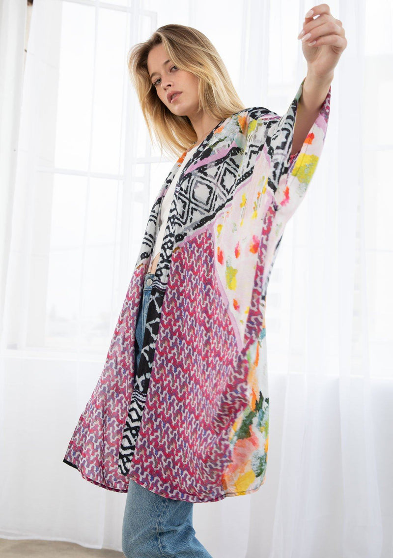 [Color: Black/Fuchsia Combo] A blond model wearing a mixed floral print mid length kimono. With a cocoon silhouette, kimono sleeves, and an open front.