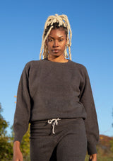 [Color: Dark Charcoal] A wool blend pullover sweater featuring long raglan sleeves, a classic crew neck, and a drawstring waist.