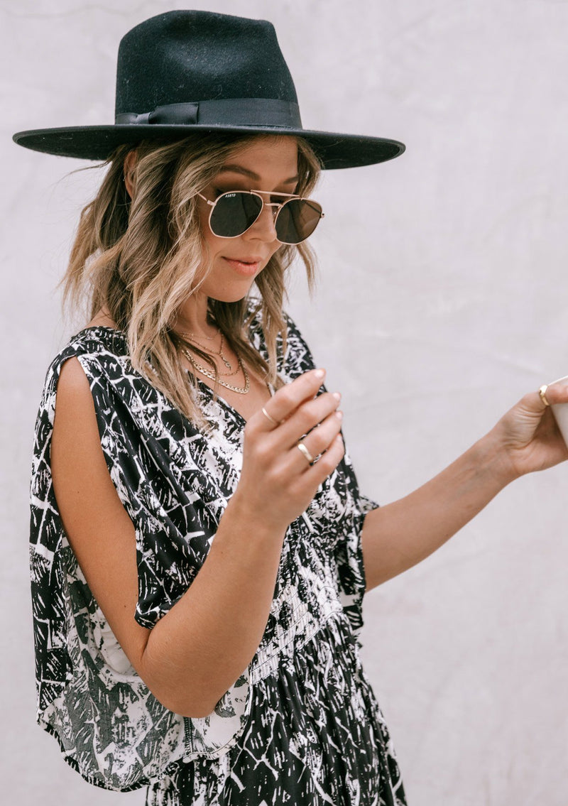 [Color: Black Combo] Girl wearing a bohemian maxi dress featuring shoulder cut-outs and kimono sleeves