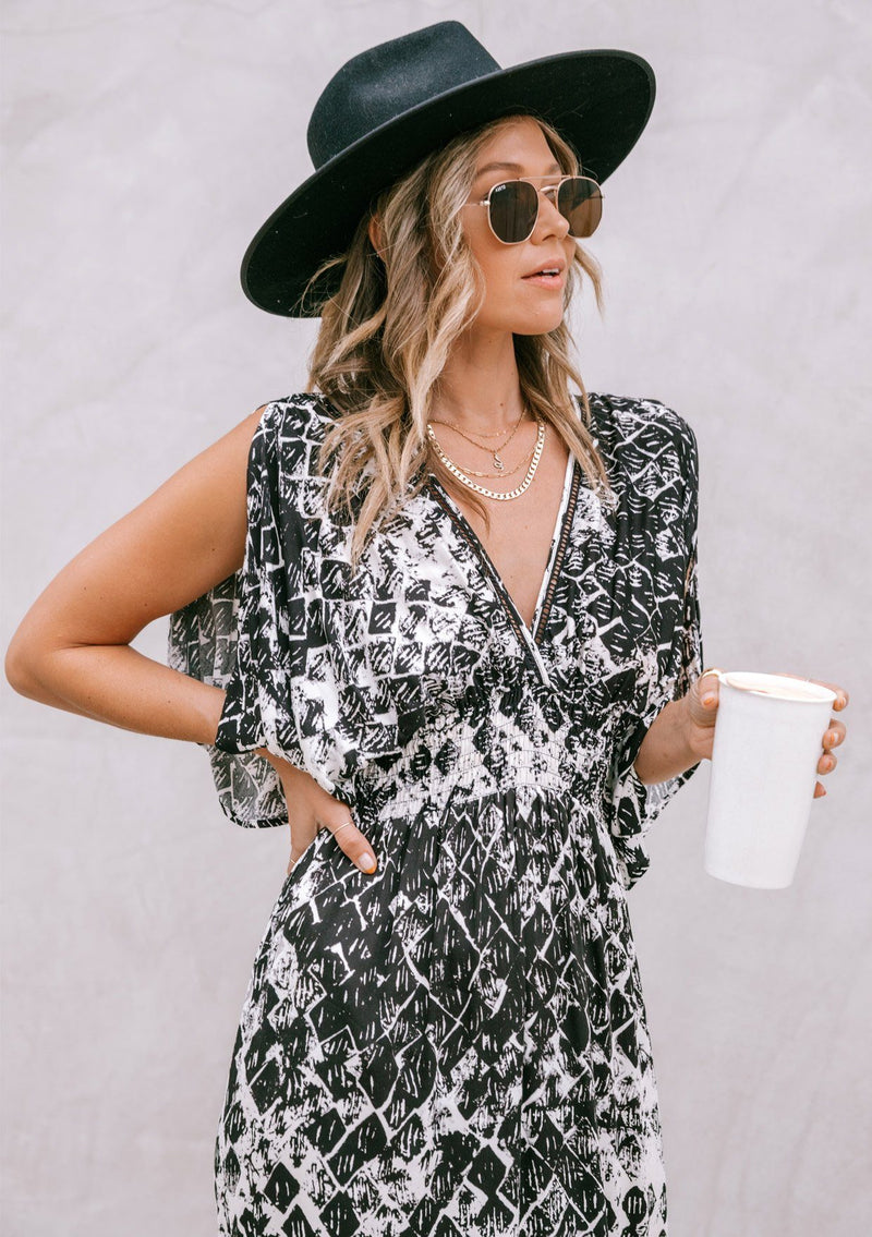 [Color: Black Combo] Girl wearing a bohemian maxi dress featuring shoulder cut-outs and kimono sleeves