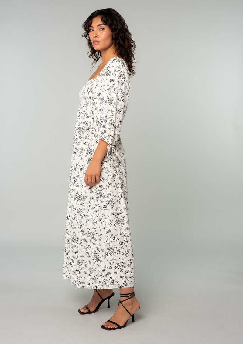 A Simple Floral Midi Dress With a Statement Necklace and Block Heels - Not  Dressed As Lamb