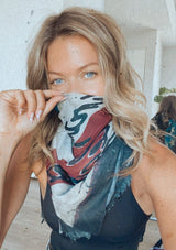 [Color: Flag] We are bringing this beautiful American Flag scarf back just when you need it most! A beautiful and chic, lightweight red, white and blue scarf with We the People printed on top. Slight distressed details add a bohemian touch. This beautiful scarf doubles as a fashionable face mask. Quarantine in style and keep yourself and others safe and healthy!