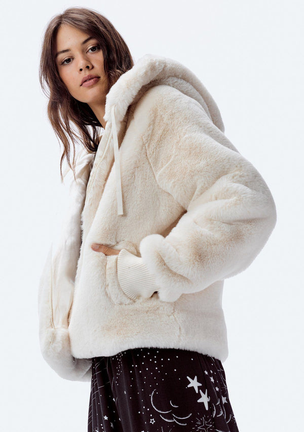 [Color: Vanilla] A classic and chic, ultra soft and flattering white faux fur jacket. Featuring a zippered front, essential side pockets, and a warm hood. 