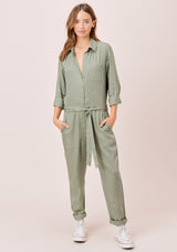 [Color: Olive] Lovestitch olive long sleeve, tencel, belted utility jumpsuit with paint splatter.