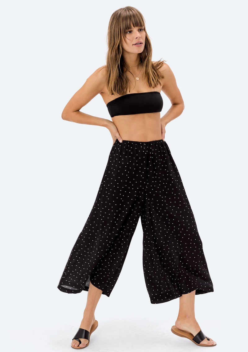 [Color: Mustard/Black] A super lightweight and flattering polka dot print culottes pant. An easy pull on style that features an elastic waist and cropped wide leg.