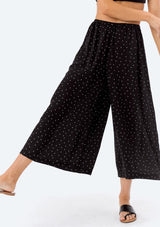 [Color: Mustard/Black] A super lightweight and flattering polka dot print culottes pant. An easy pull on style that features an elastic waist and cropped wide leg.