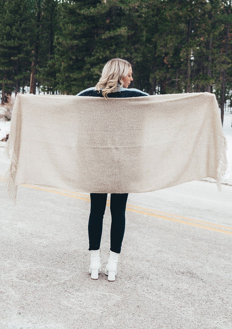 [Color: Cream] A super soft and fuzzy marled scarf. Featuring a cool fringed trim. A classic layering accessory in a soft neutral color.