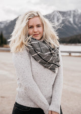 [Color: Black/Grey] Wrap yourself up in this cozy, oversized plaid scarf wrap with mini fringe trim. A classic style that pairs effortlessly with everything.